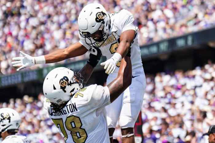 Savion Washington lifting up Dylan Edwards at TCU